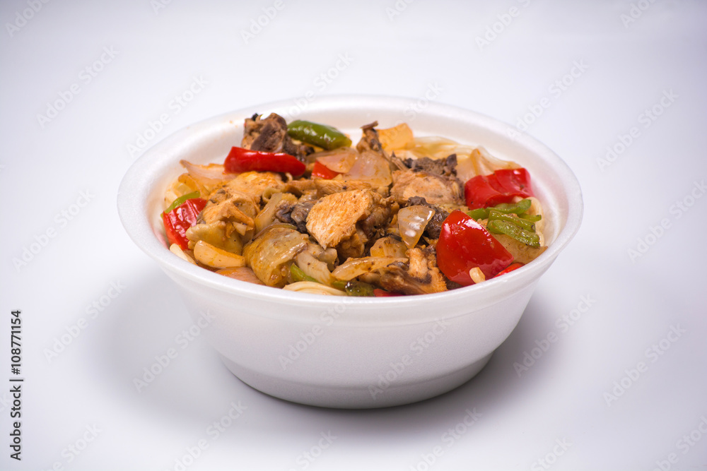 Chinese noodles with a chicken and vegetables