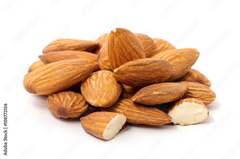 Heap of almond nuts isolated on white background Heap of almond nuts isolated on white background