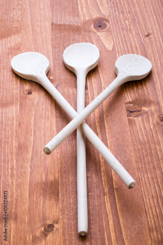 wooden spoons on wooden table