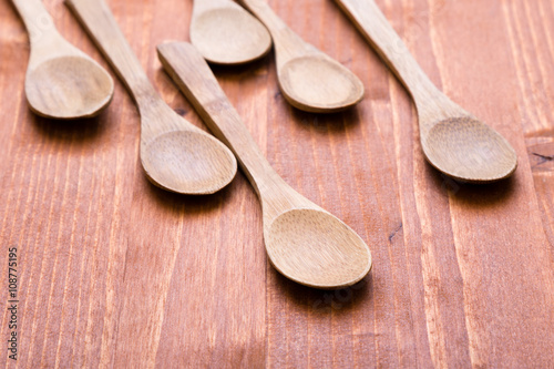 wooden spoons on wooden table