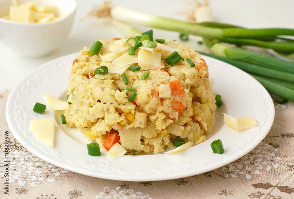 Millets with vegetables, spring onion and cheese Millets with vegetables, spring onion and cheese