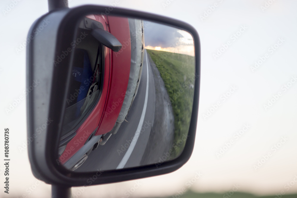 Fototapeta premium Car rearview mirror with lights