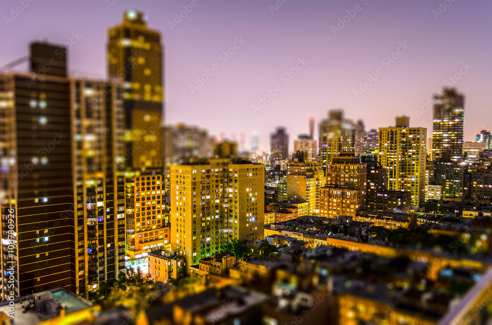 Obraz premium Aerial view of Manhattan at night. Tilt-shift effect applied