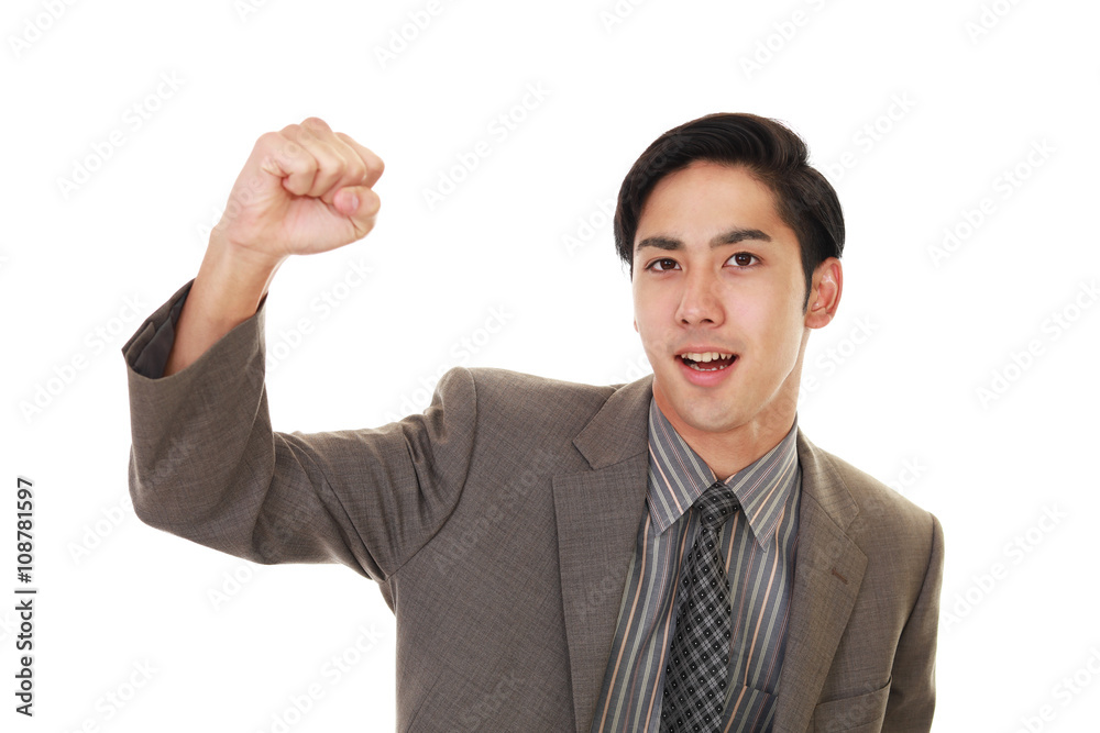 ガッツポーズのビジネスマン