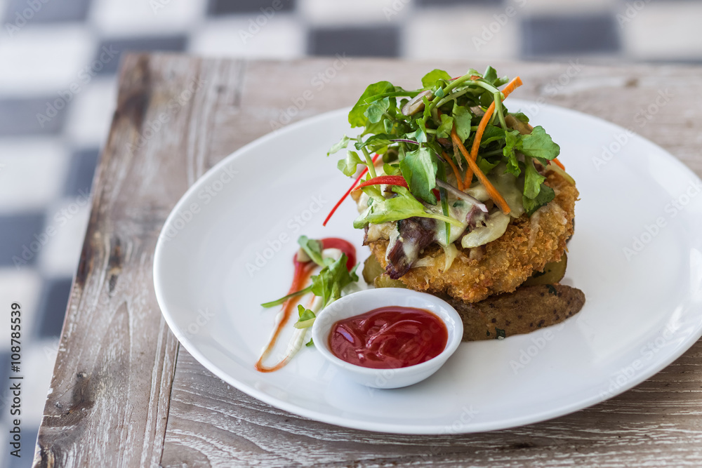 Deep fried chicken with salad and tomato ketchup on white plate Deep fried chicken with salad and tomato ketchup on white plate