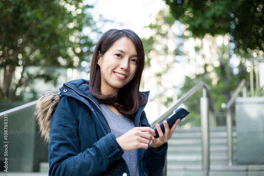 Young woman use of mobile phone