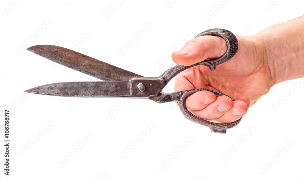 Hand cutting with old scissors foto de Stock | Adobe Stock