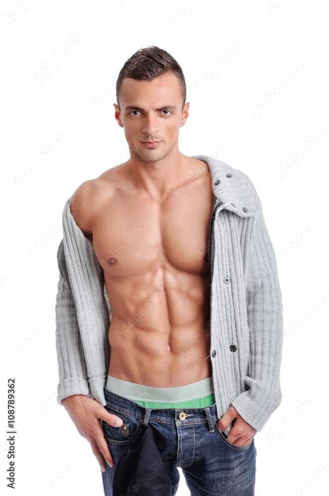 Portrait of Powerful Muscular Man Posing on a White Background Portrait of Powerful Muscular Man Posing on a White Background