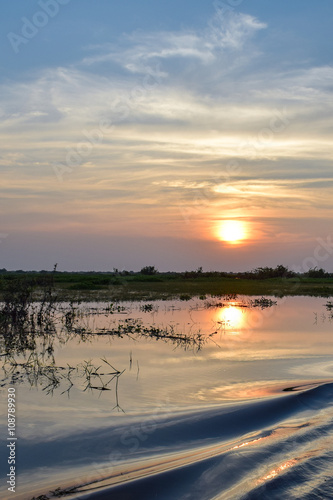 Fototapeta Naklejka Na Ścianę i Meble -  River sunset in Cambodia during summer