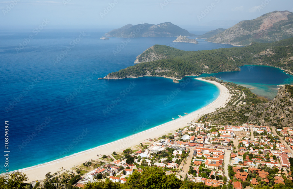 Town and beach on a coast of mediterranean sea.