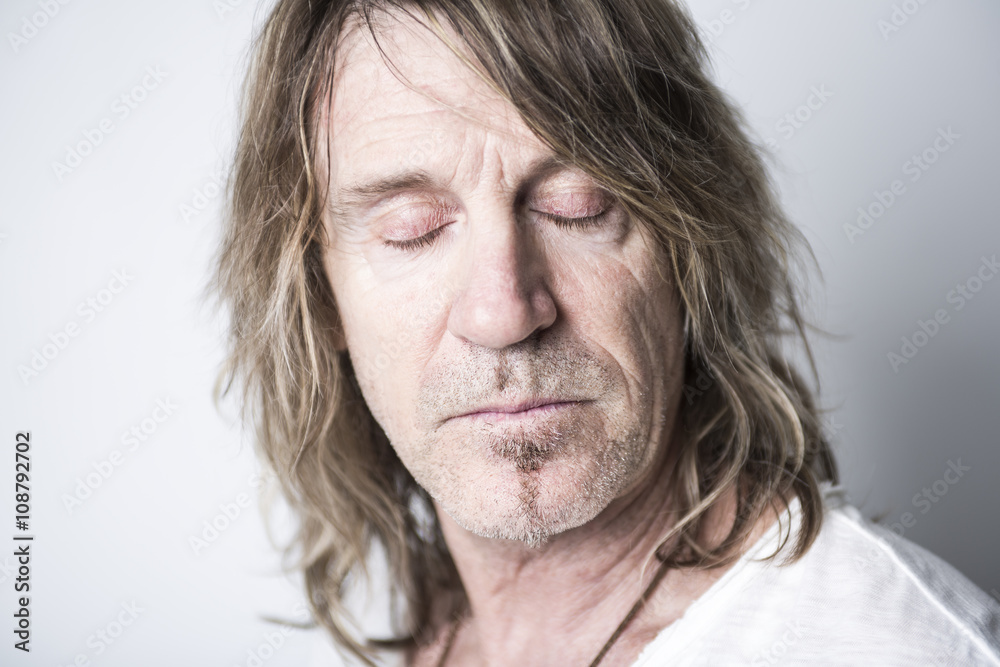 Portrait of a man in studio Portrait of a man in studio