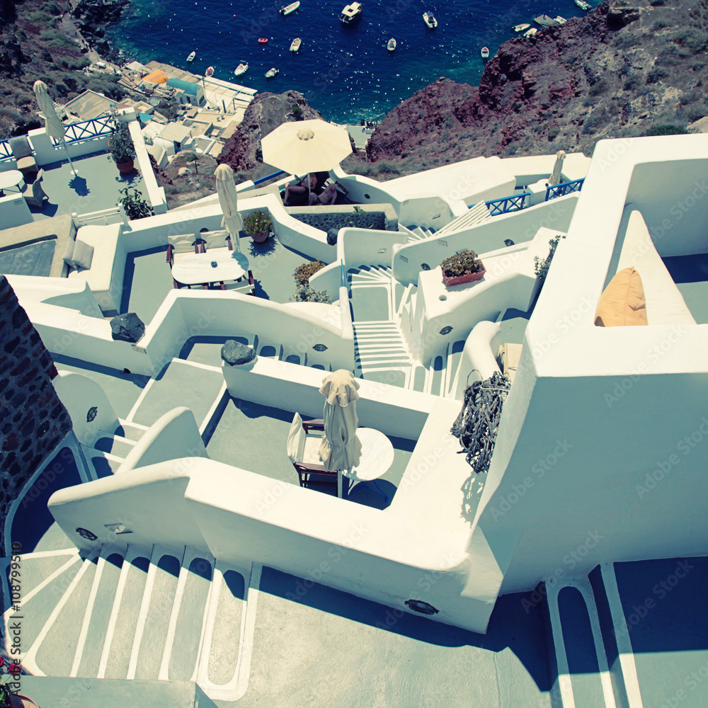 grey and white staircases in volcanic village Oia, Santorini, Greece grey and white staircases in volcanic village Oia, Santorini, Greece