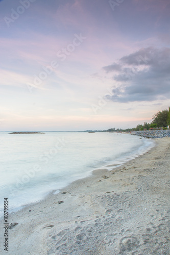 Long exposure dramatic tropical sea and sky sunset(Un-focus imag