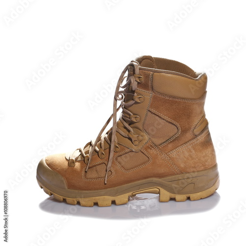 Combat boot single viewed from side isolated on white background