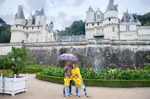 Beautiful family of four in front of Usse Castle, Indre-et-Loire photo