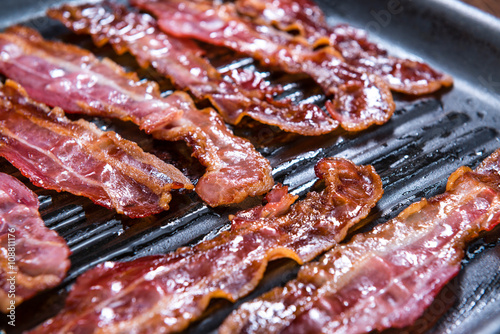 Quadro em tela Skillet with fried Bacon