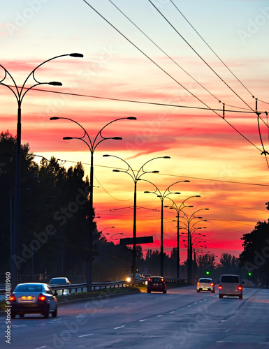 Trafic on highway at sunset