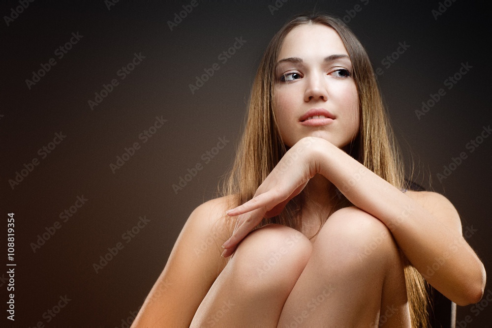 Naklejka premium Photo of young magnificent woman with long hair