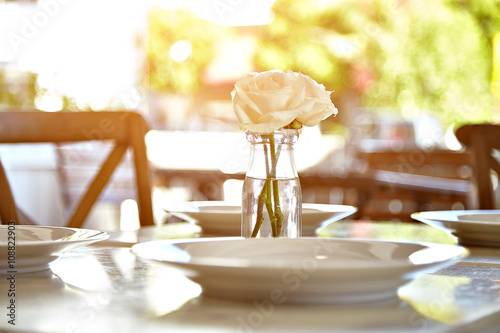 Canvastavla Served table at summer terrace cafe