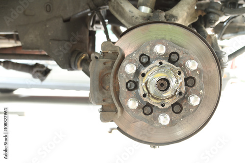 Front disc brake repairing in garage