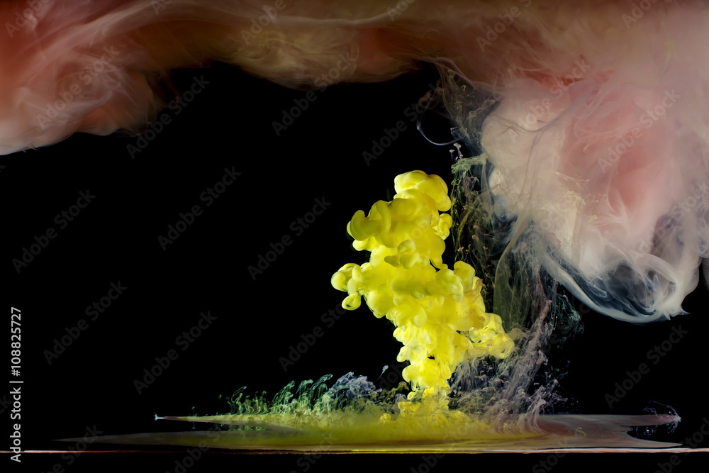 Obraz premium liquid multi-colored paint mixed moving in water