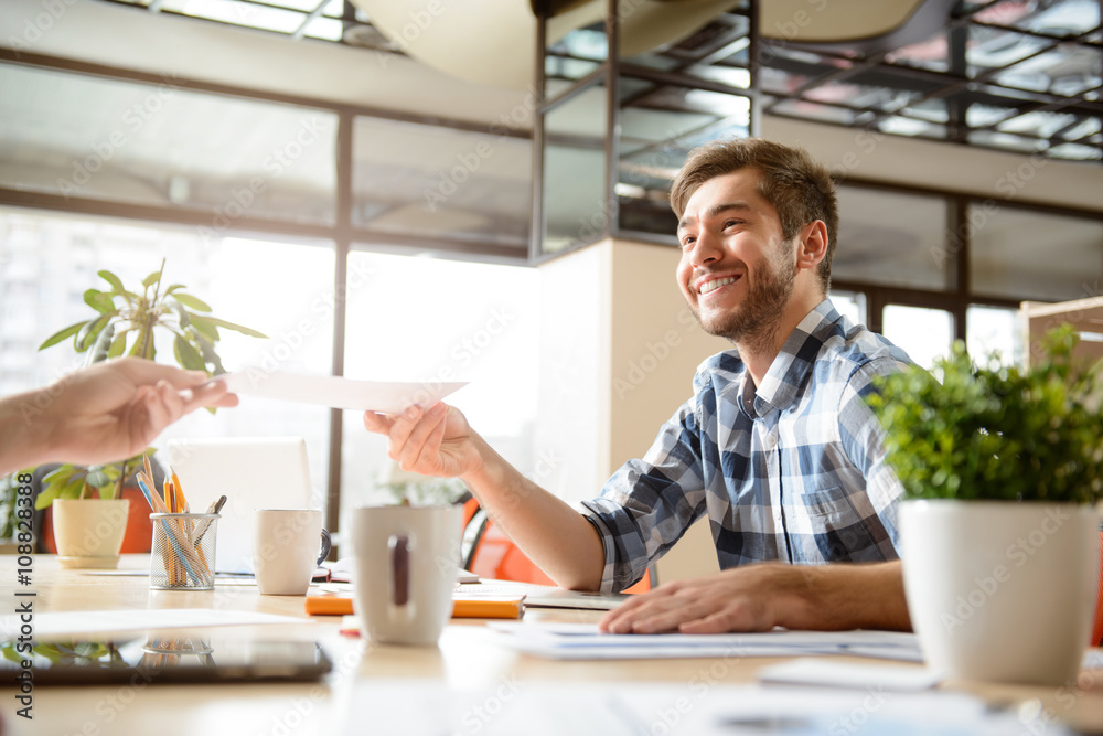 Positive man working in the office Positive man working in the office
