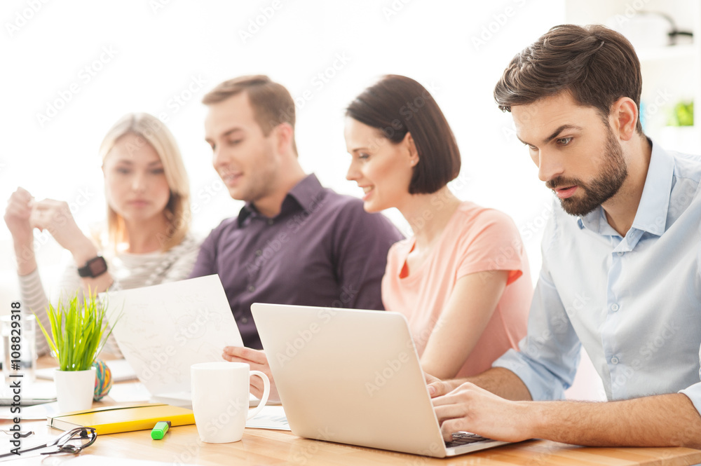 Pretty creative team is discussing a project Pretty creative team is discussing a project