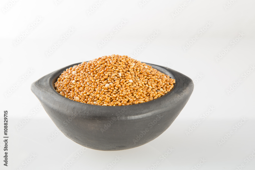 Millet cereal grains with container Millet cereal grains with container