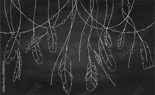 Hand drawn sketch feathers of dream catcher. Blackboard backgrou