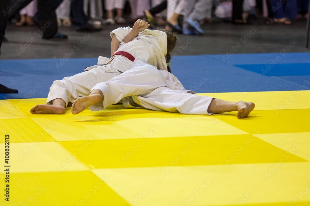 Girls compete in Judo Girls compete in Judo