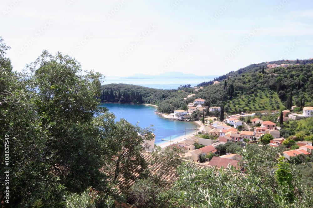 Holiday resort with villa beach sea olive trees and islands	