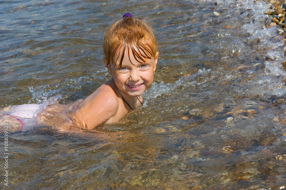 Happy red-haired child of the sea Happy red-haired child of the sea