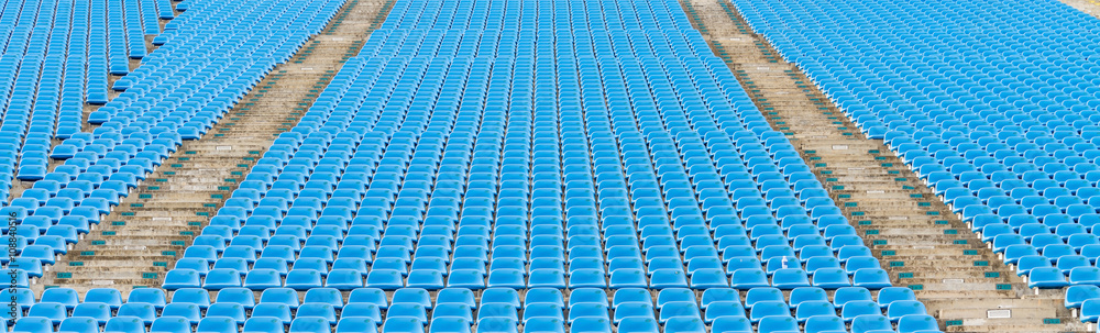 Fototapeta premium empty blue plastic grandstand seats or stadium seats, pattern with number