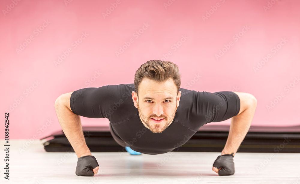 Portrait of a Young Man Doing Pushups Portrait of a Young Man Doing Pushups