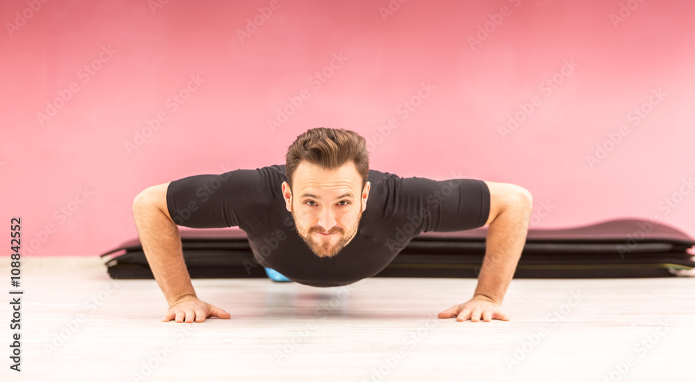 Portrait of a Young Man Doing Pushups Portrait of a Young Man Doing Pushups