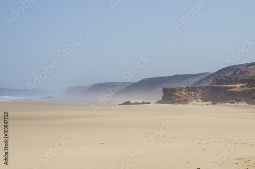 A view of beautiful Bordeira beach, famous surfing place in Algarve region, Portugal