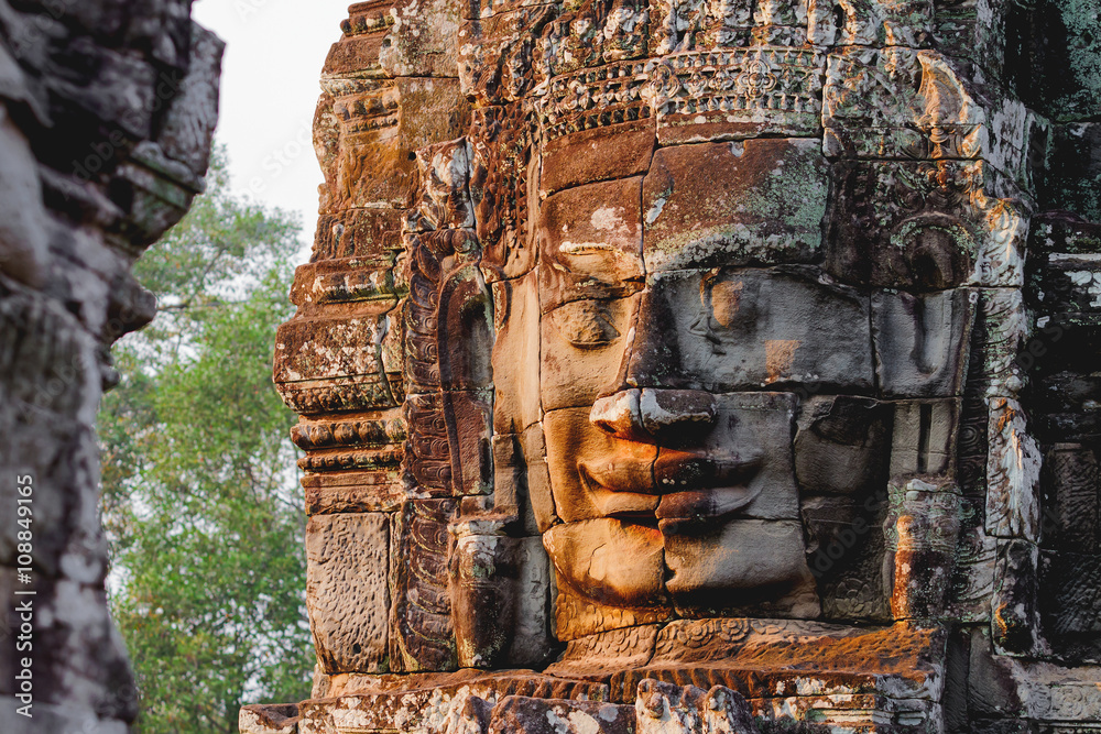 Naklejka premium Towers with faces in Angkor Wat, a temple complex in Cambodia