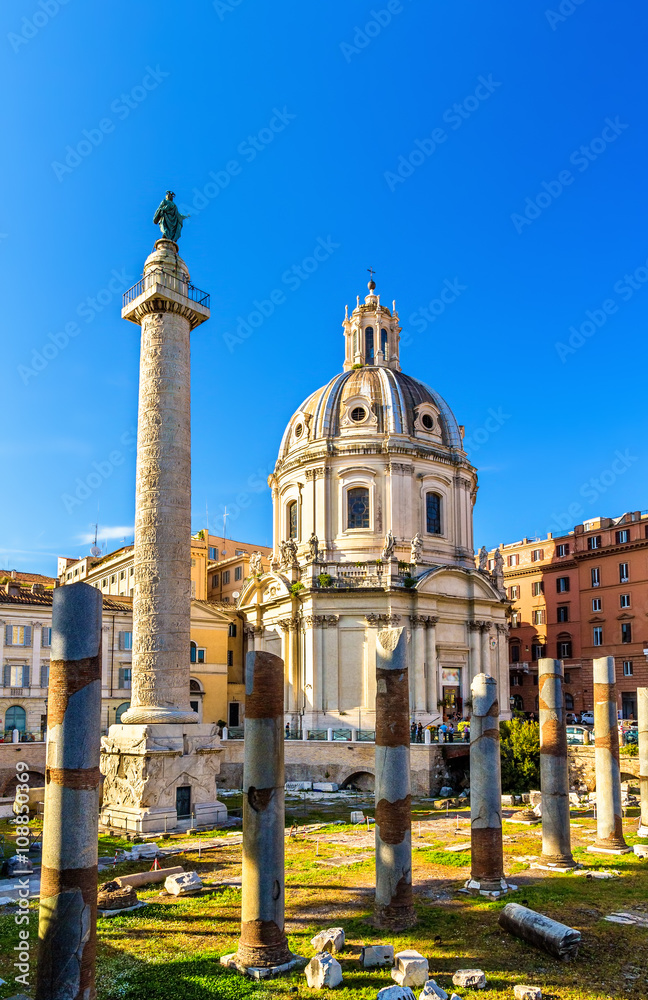 Trajan's Column and Santissimo Nome di Maria al Foro Traiano Church in Rome