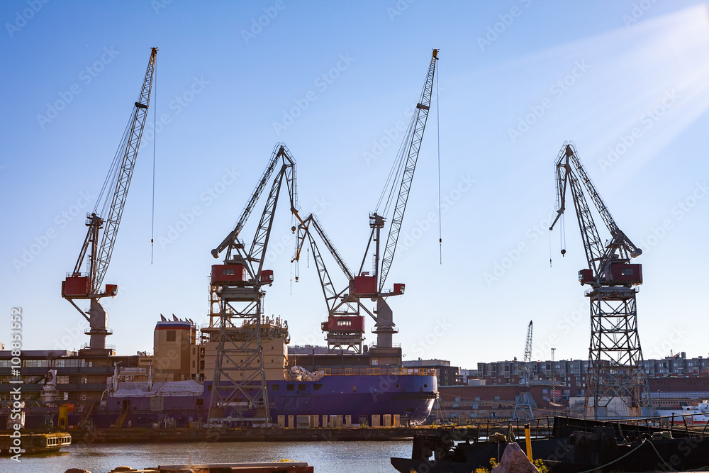 Harbor cranes in sea port of Helsinki, Finland. 