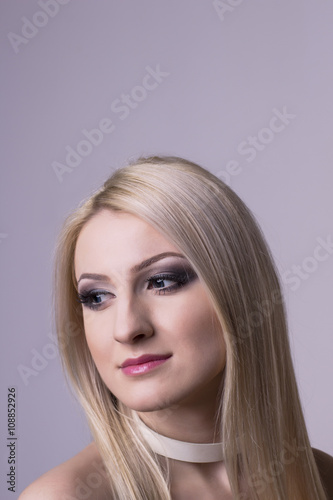 Lovely blonde woman face closeup