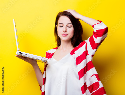 portrait of the young woman with laptop