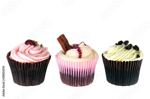 Three cupcakes isolated over white background