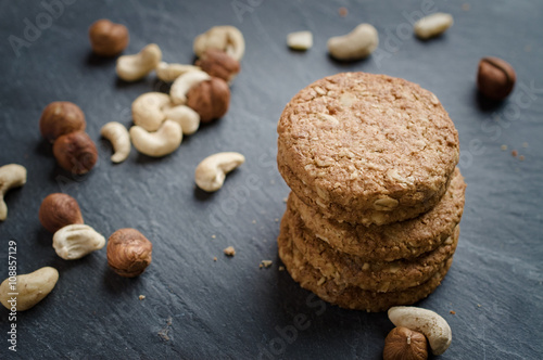 Whole grain cereal shortbread biscuits cookies stacked on black