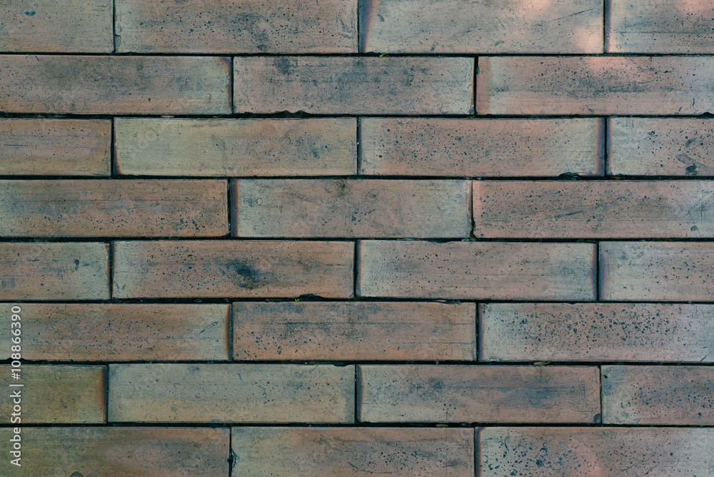 Weathered stained old brick wall background. Weathered stained old brick wall background.