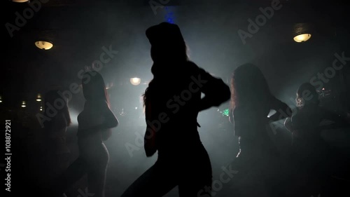 silhouettes of girls dancing 