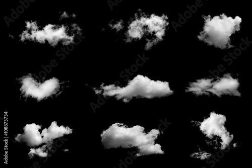 Set of isolated clouds on black background. photo