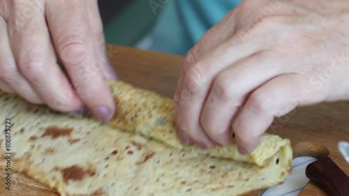 Cook pancakes stuffed with mushrooms