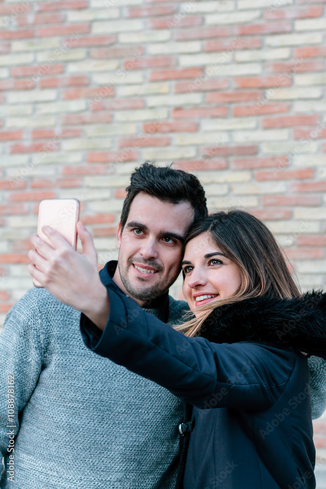 Couple making a self-portrait Couple making a self-portrait