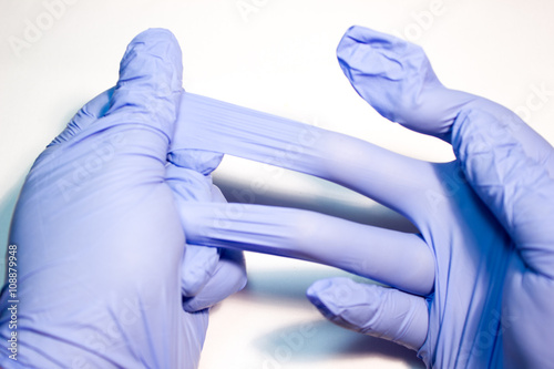 Medical gloves on white background