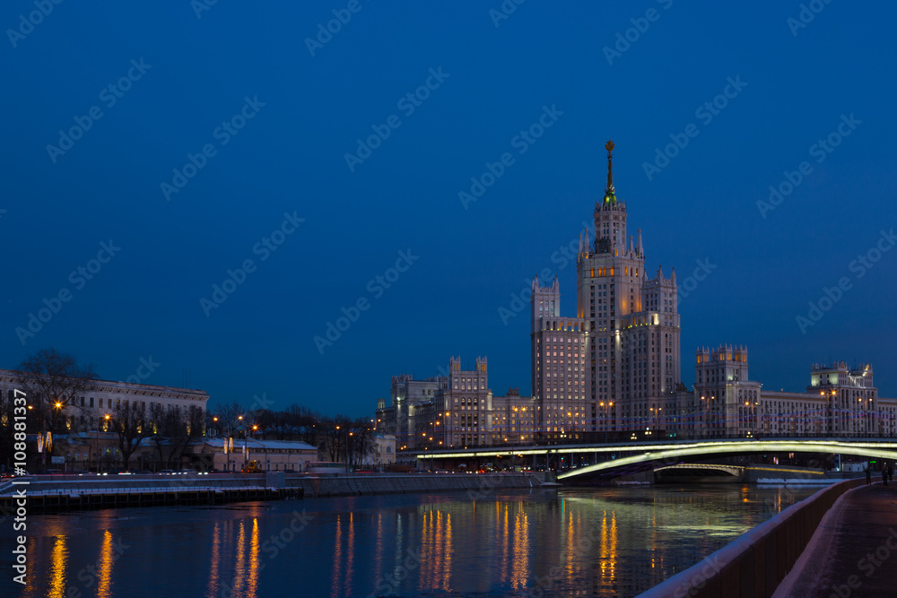 One of seven Stalin skyscrapers: the high-rise building on Kotelnicheskaya Embankment in night illumination, Moscow